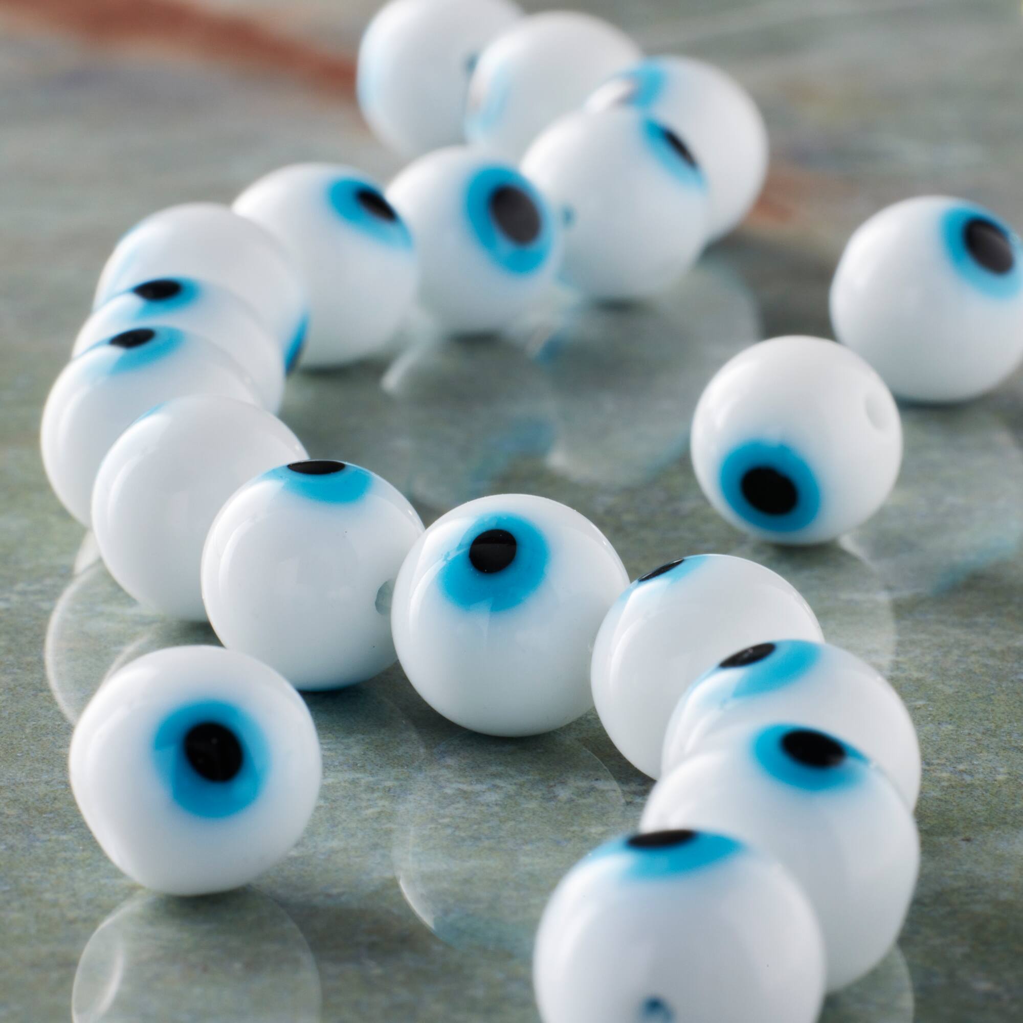 12 Pack: White Evil Eye Glass Round Beads by Bead Landing